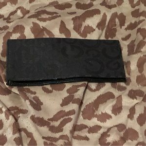 Guess checkbook holder